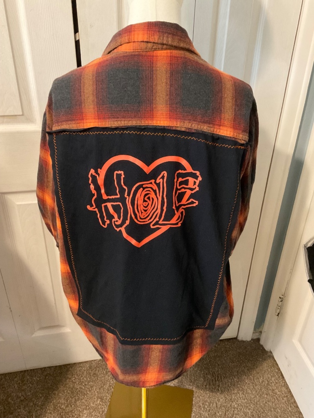 Hole Upcycled Back Graphic T-Shirt on Women's Large Flannel